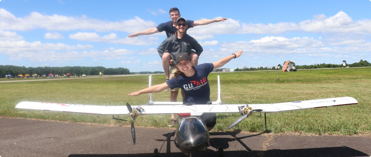 Members of the CU Air team pose with their aircraft